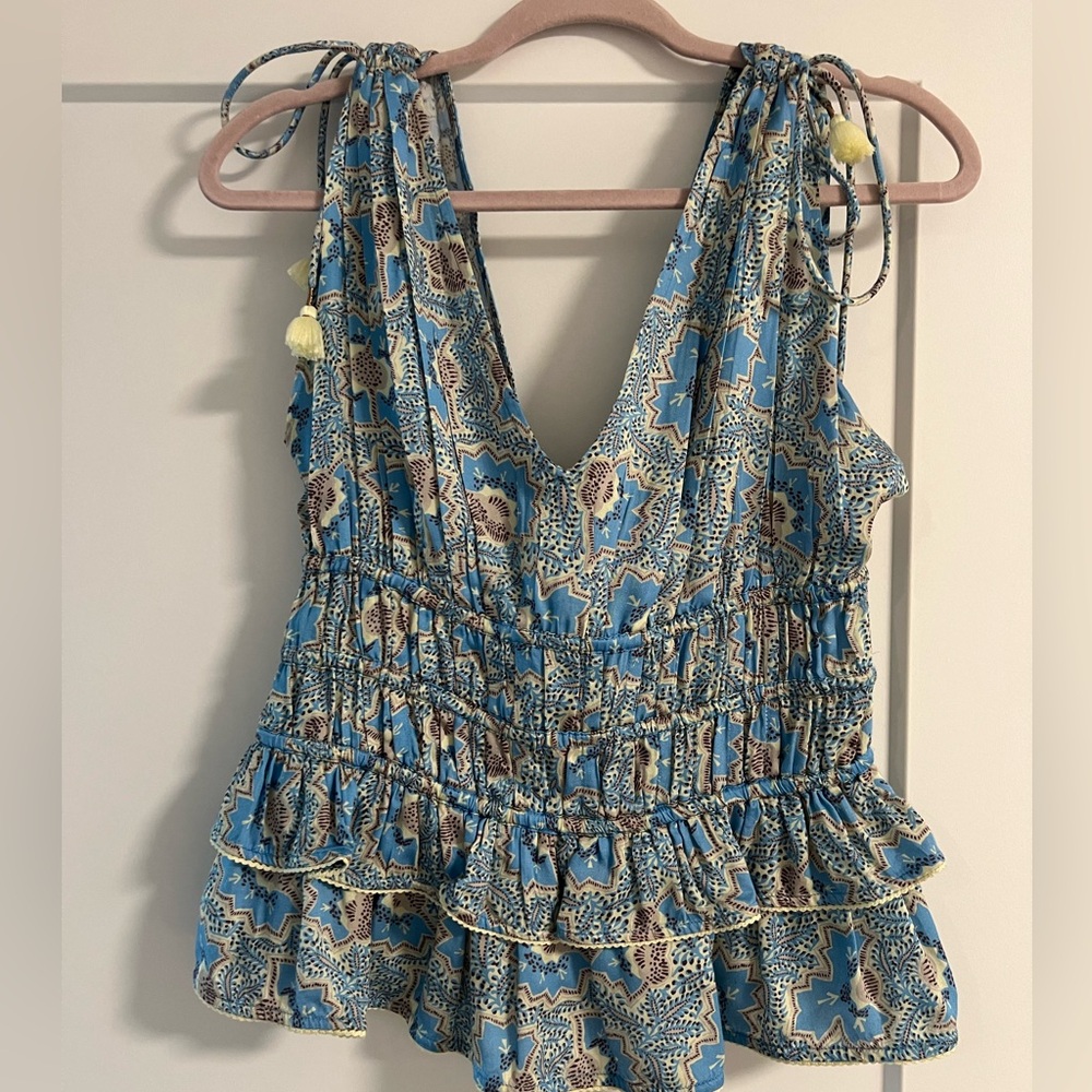 Beautiful pop of color peplum top